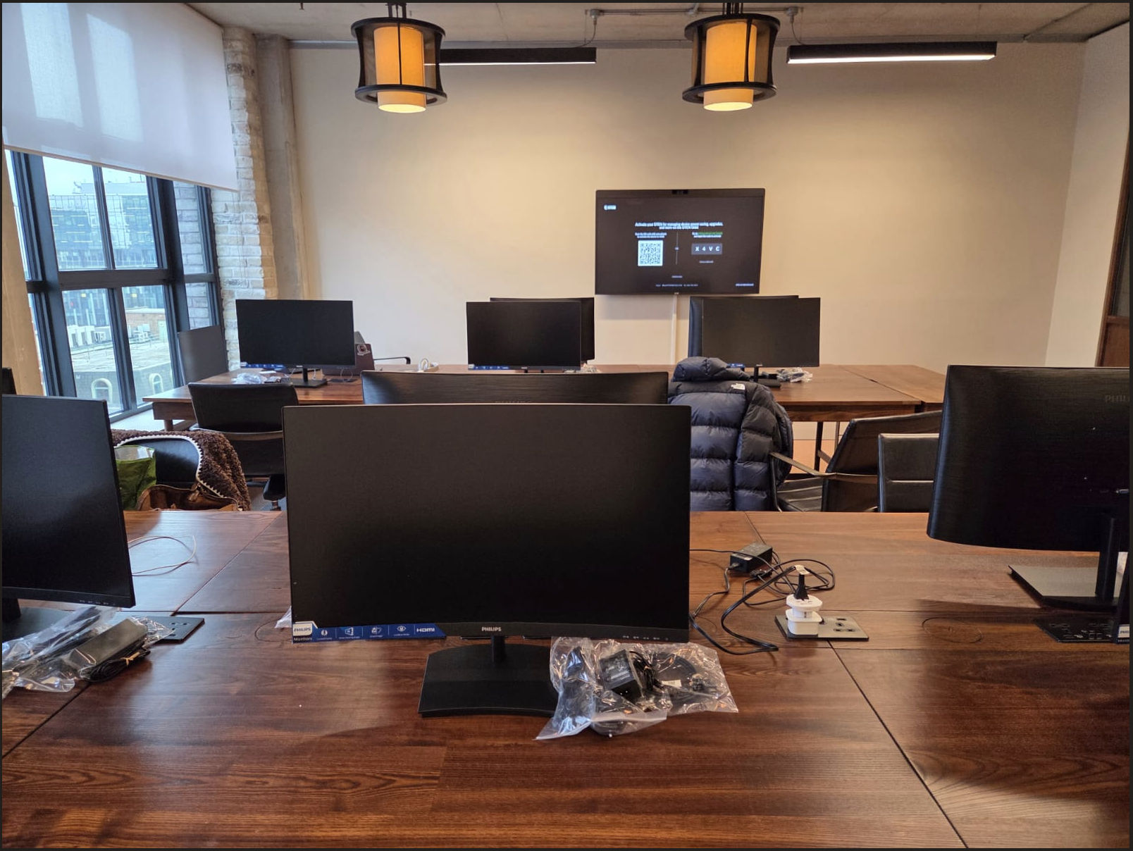 Collaboration system test call in Dr Squatch’s London office during commissioning and validation of the meeting room technology.