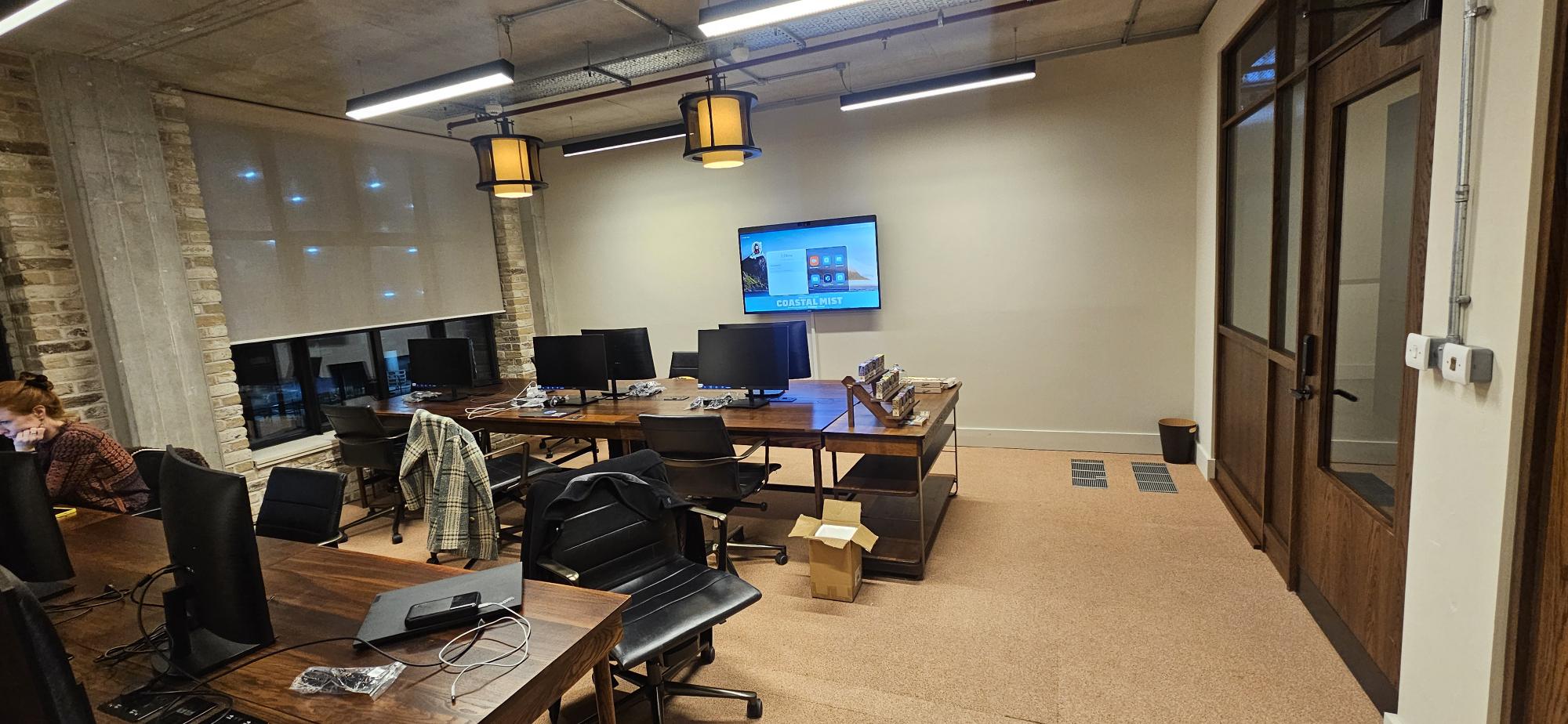 Completed collaboration space in Dr Squatch’s London office with integrated meeting room technology installed by BoomSpace.